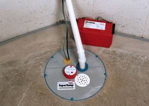 A sump pump system with a battery backup system installed in Effort
